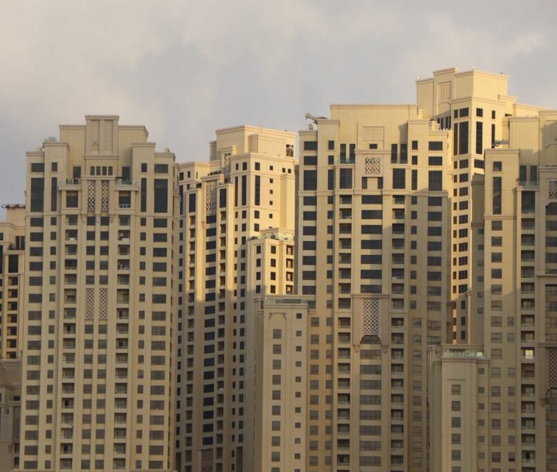A close-up view of modern high-rise buildings in Dubai Marina, showcasing architectural detail and luxury living.